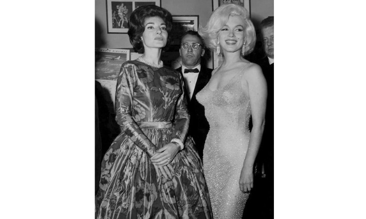 Opera singer Maria Callas and actress Marilyn Monroe meet at former President John F. Kennedy’s birthday party in 1962; an encounter between icons of both the classical and pop culture worlds.