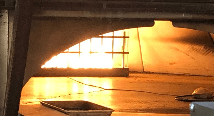 Stone stove with big flames.