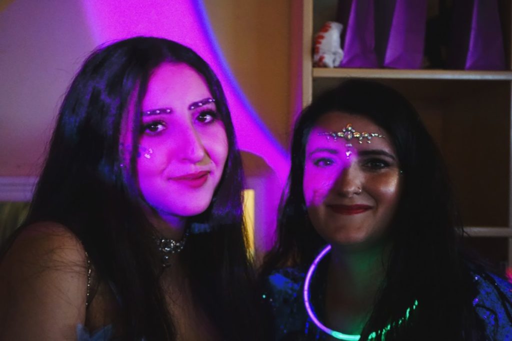 
Balsem Jridi and Zara Paru PTK students wearing face glitters at the Prom