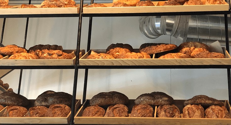 Fresh bread rolls on display.
