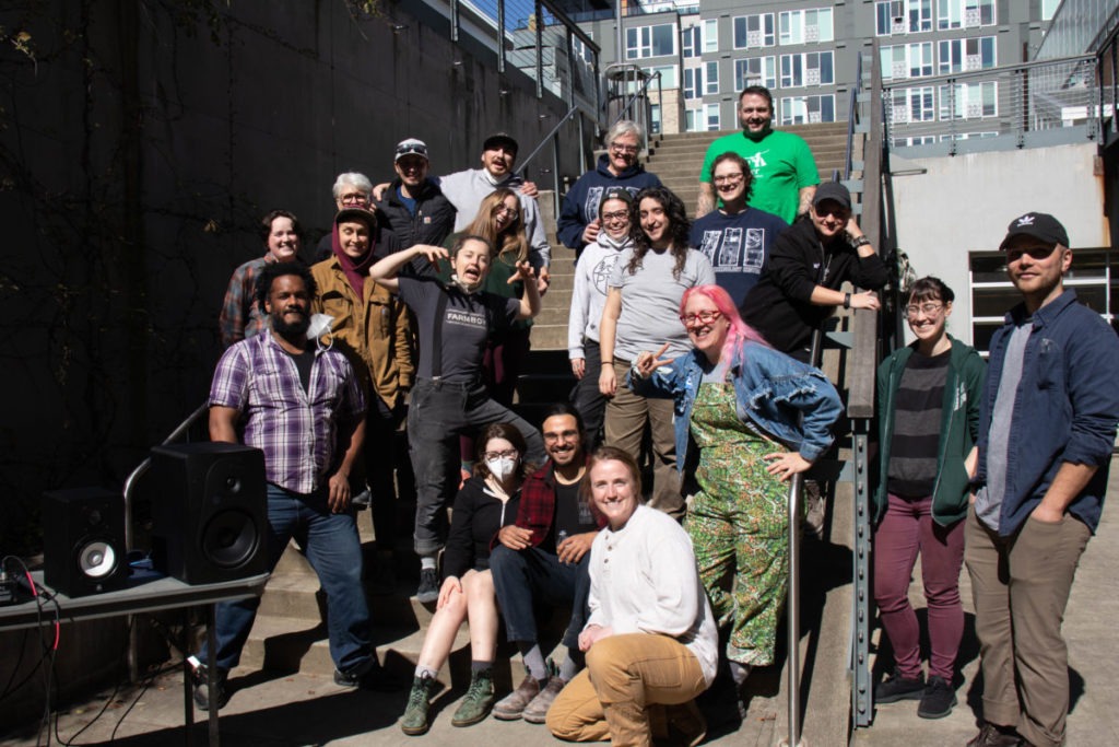 A group photo of faculty and students at the Wood Technology Center in the Judkins Park neighborhood.