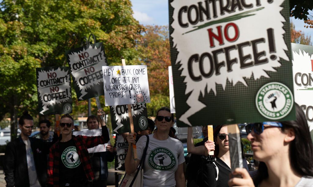 Workers organize to protest outside of Starbucks Headquarters