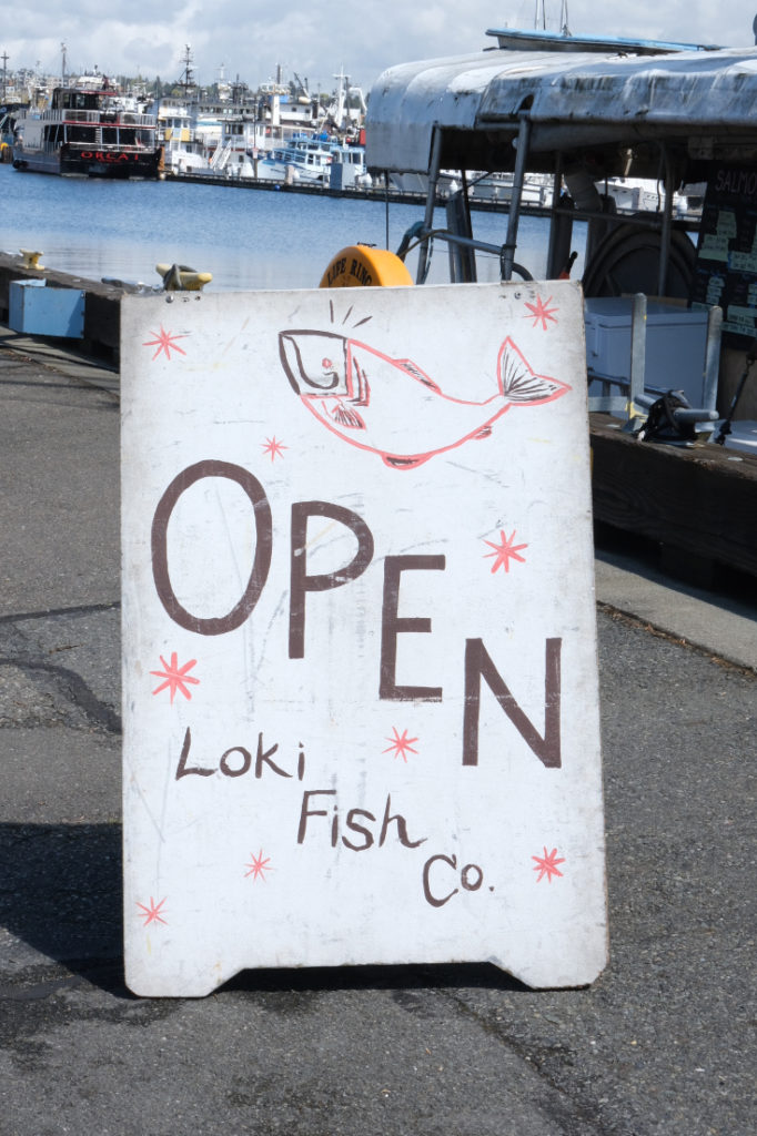 Loki Fish Co. beckoning customers to try their high-quality salmon.