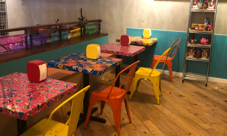 Colorful chairs at El Lugar.